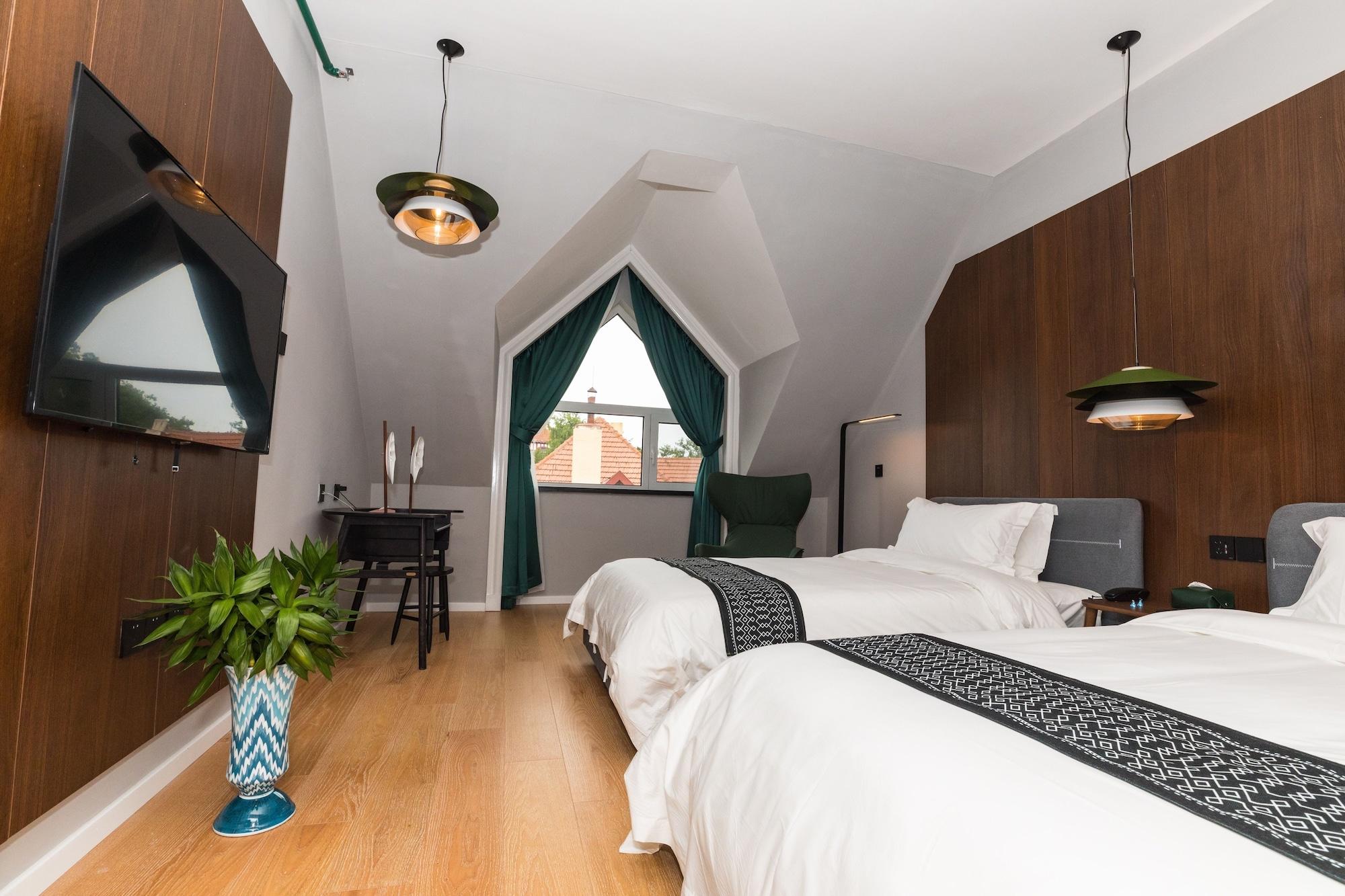 Qingdao The Castle Hotel Bagian luar foto